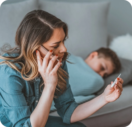 Image Femme avec enfant malade